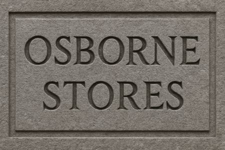 A ChatGPT generated image of a stone plaque with the inscription “Osborne Stores”